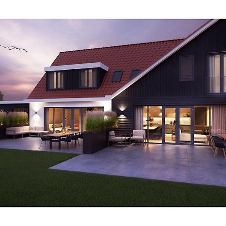Modern 8 person villa in De Cocksdorp  Buitenkant foto